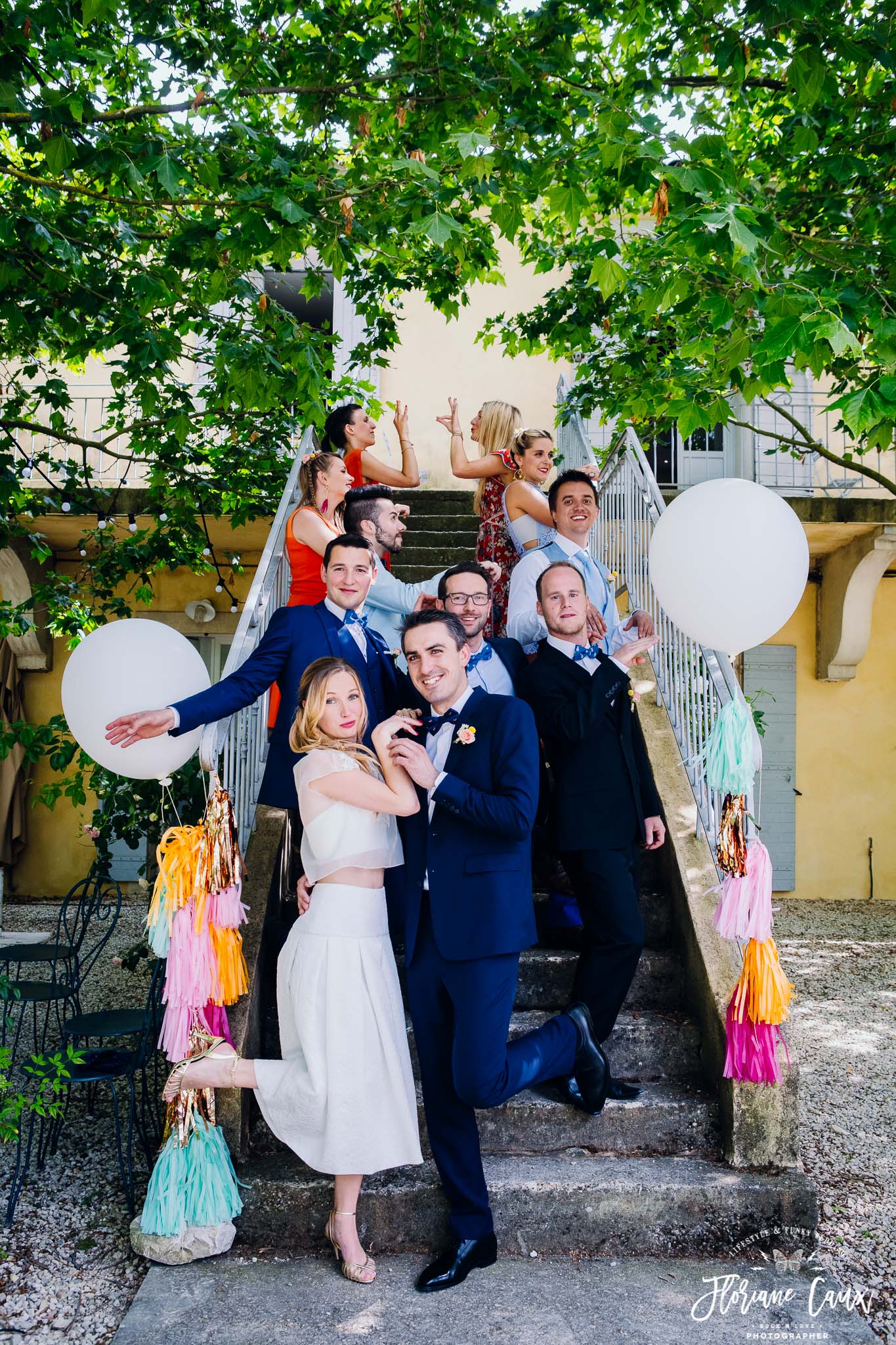 photo de groupe mariage flamand rose