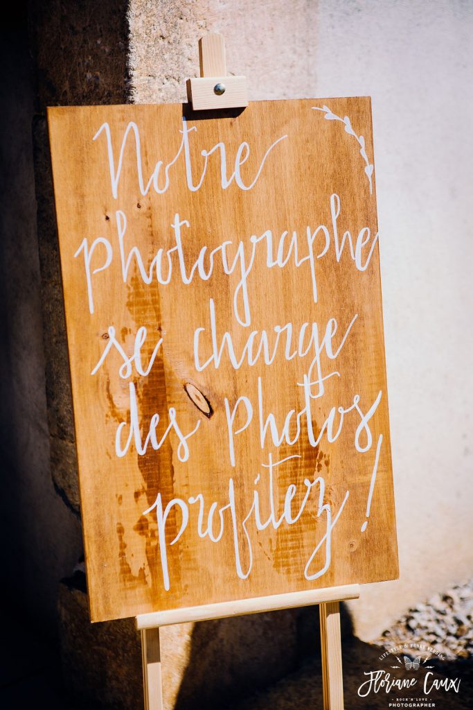 panneau photographe se charge des photos mariage